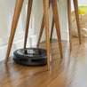 iRobot-Roomba-i7-Wi-Fi-Connected-Robot-Vacuum-Cleaner-listing-under-chair